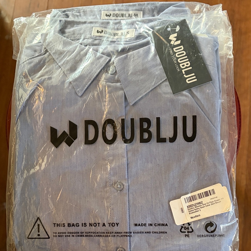 Doublju Women’s slim fit button down. Purchased to use as restaurant uniforms.